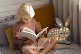 Little Lights high-quality children's night light is handmade from 100% natural pinewood, making it as strong and durable as it is beautiful. This adorable Little Lights Bunny Lamp is guaranteed to hop its way into your little one's heart and help them sleep soundly.