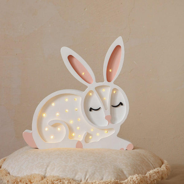 Little Lights high-quality children's night light is handmade from 100% natural pinewood, making it as strong and durable as it is beautiful. This adorable Little Lights Bunny Lamp is guaranteed to hop its way into your little one's heart and help them sleep soundly.  Give this drowsy little rabbit a home to rest its head in today!